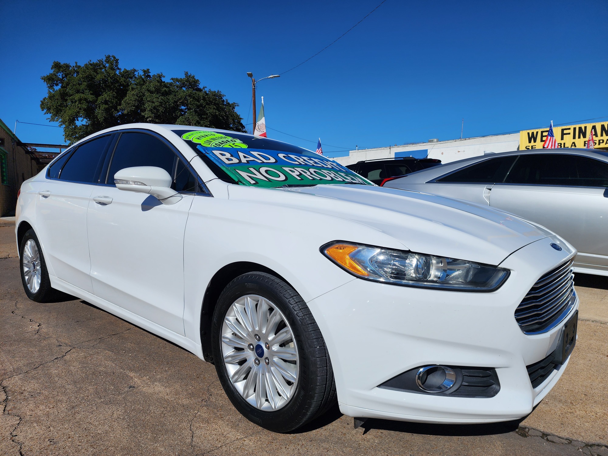 2015 WHITE Ford Fusion Hybrid S (3FA6P0UU3FR) with an 2.0L L4 DOHC 16V HYBRID engine, CVT transmission, located at 2660 S.Garland Avenue, Garland, TX, 75041, (469) 298-3118, 32.885387, -96.656776 - Welcome to DallasAutos4Less, one of the Premier BUY HERE PAY HERE Dealers in the North Dallas Area. We specialize in financing to people with NO CREDIT or BAD CREDIT. We need proof of income, proof of residence, and a ID. Come buy your new car from us today!! This is a 2015 FORD FUSION HYBRID S L - Photo #1